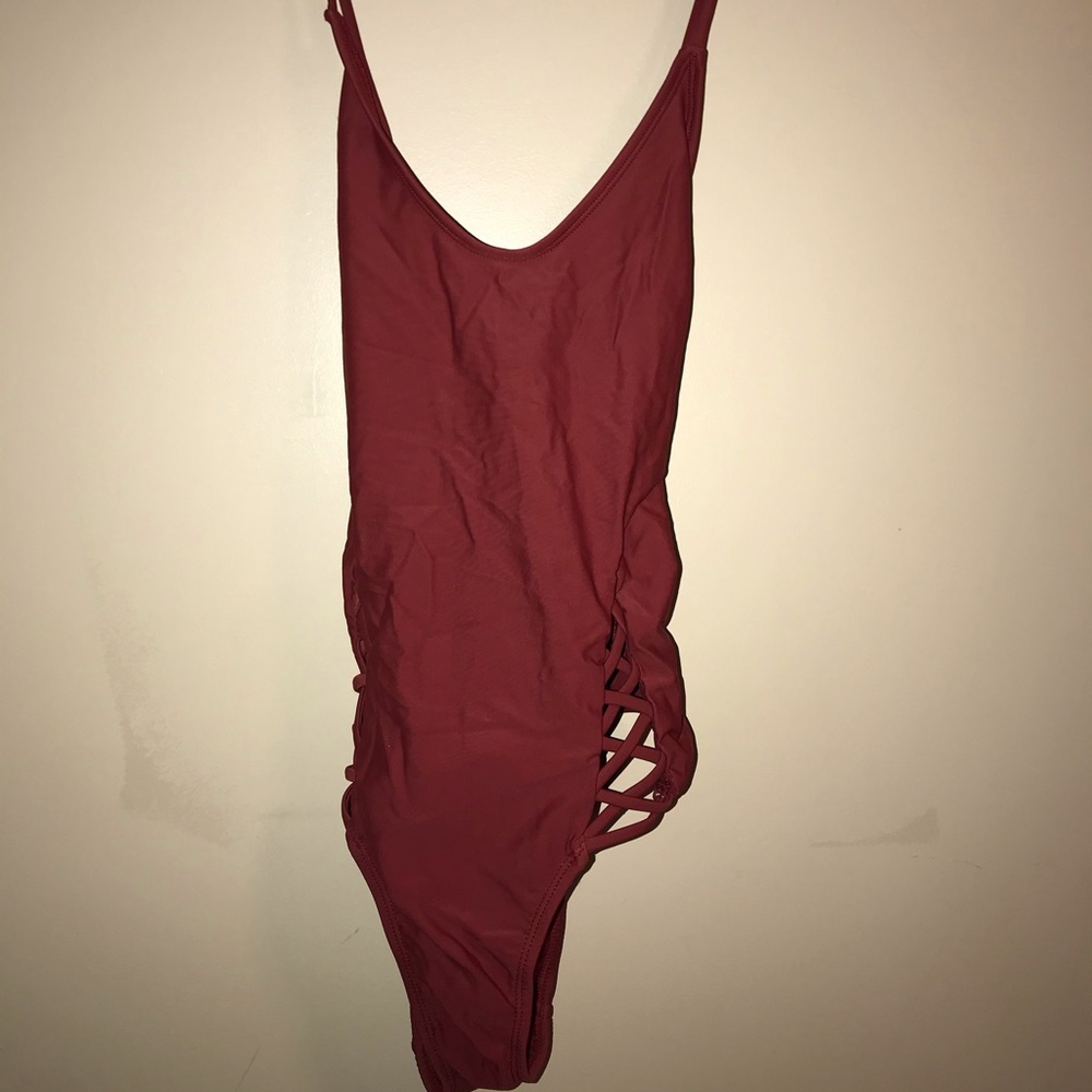 Once piece orange swimsuit! Worn twice!